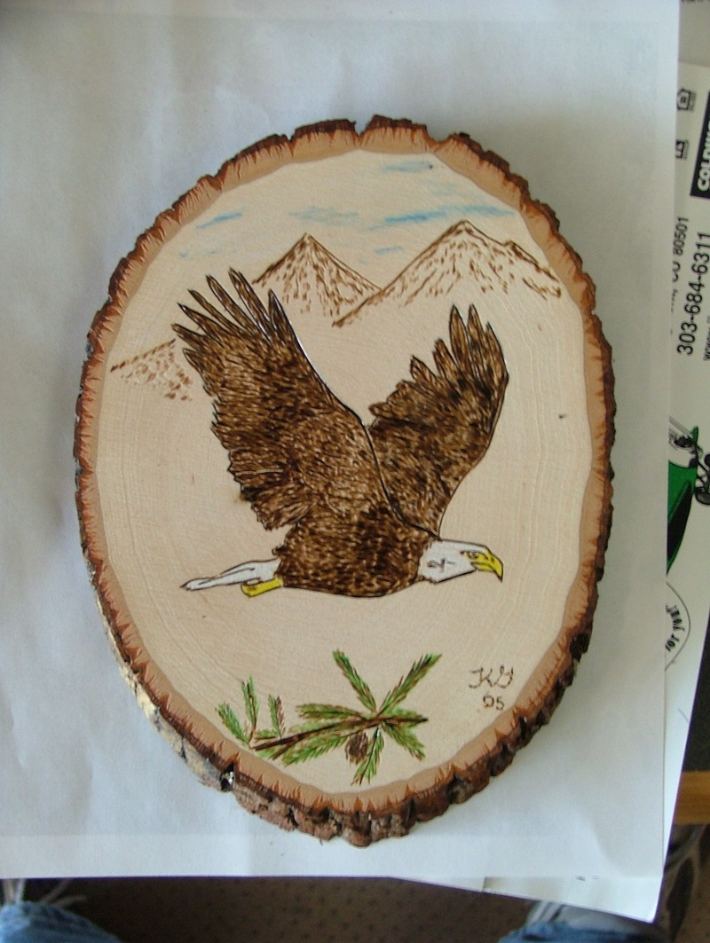 Bald Eagle on basswood round.; DISPLAY FULL IMAGE.