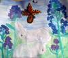 Alpine scenery-White rabbits, surrounded by blue wildflowers