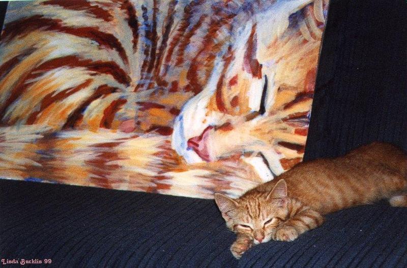 Cat with painting; DISPLAY FULL IMAGE.